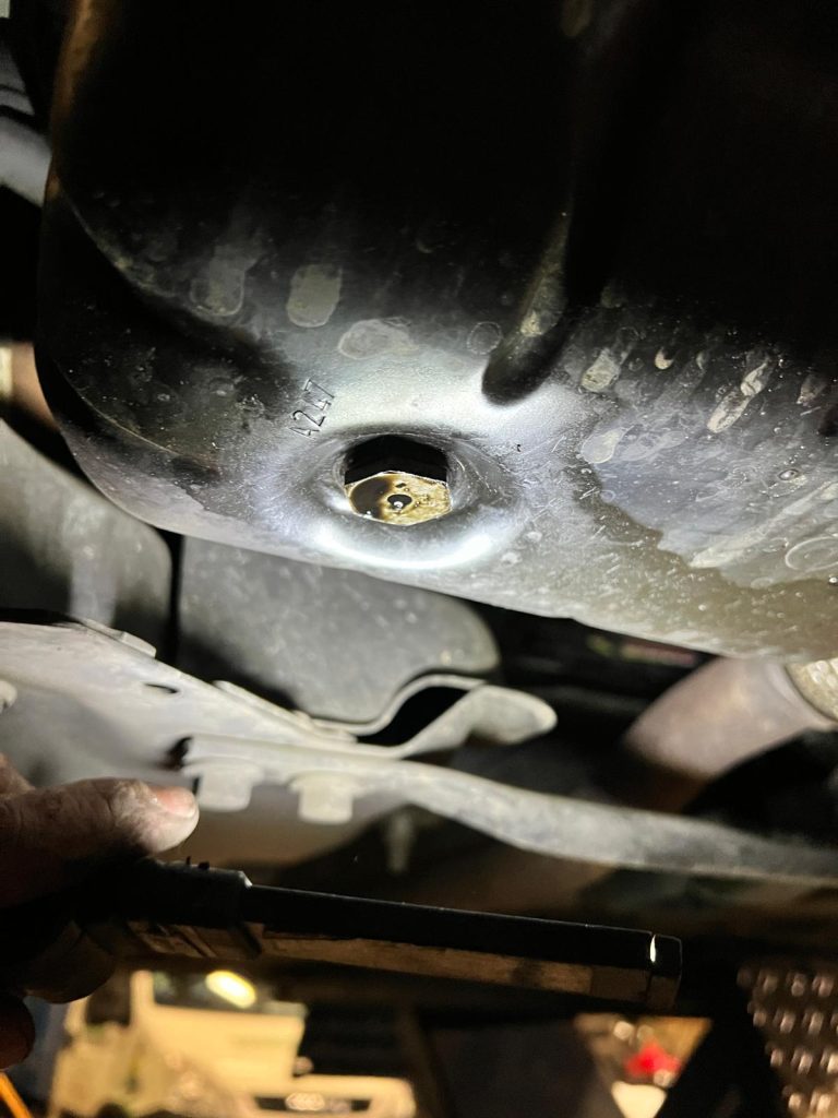Remplacement du Carter Moteur sur une Peugeot 207 à Bennwihr, proche d’Andolsheim